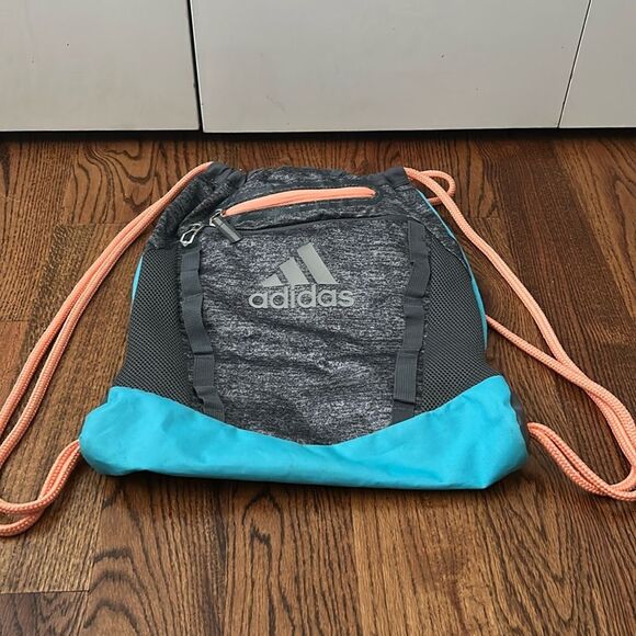 adidas Unisex Rumble II Sackpack, Onix Jersey/Bright Cyan/Onix/Chalk Cora - Picture 1 of 5